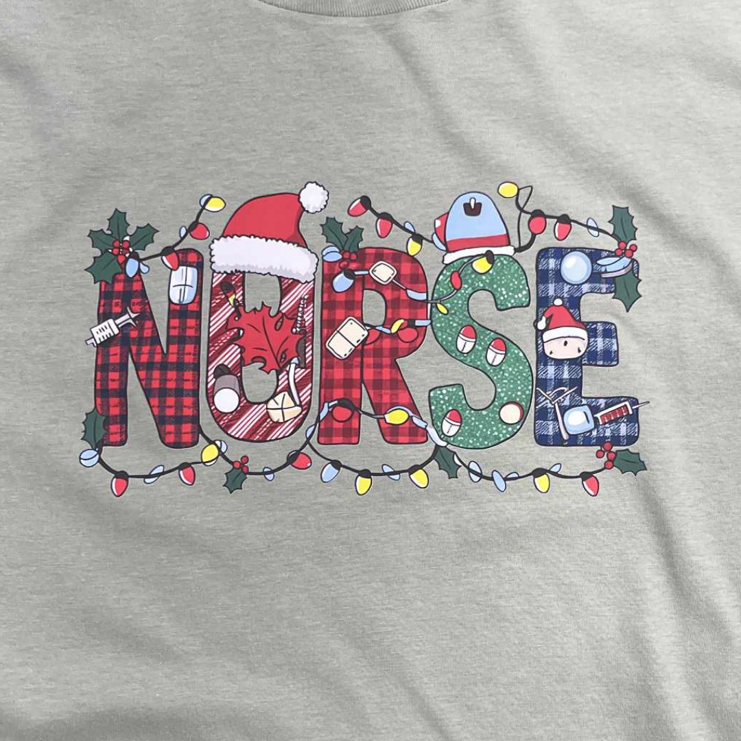 Christmas Nurse T-Shirt | Holiday Nurse Shirt with Lights and Santa Hat | Festive Nursing Graphic Tee